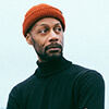 Black man in a red hat