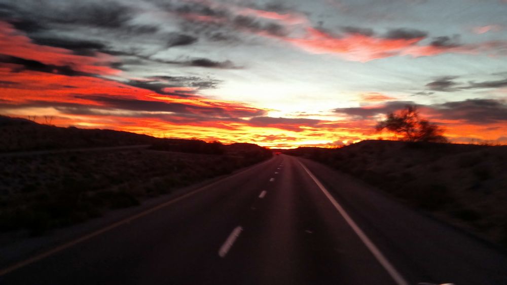 dramatic sunset on an empty road
