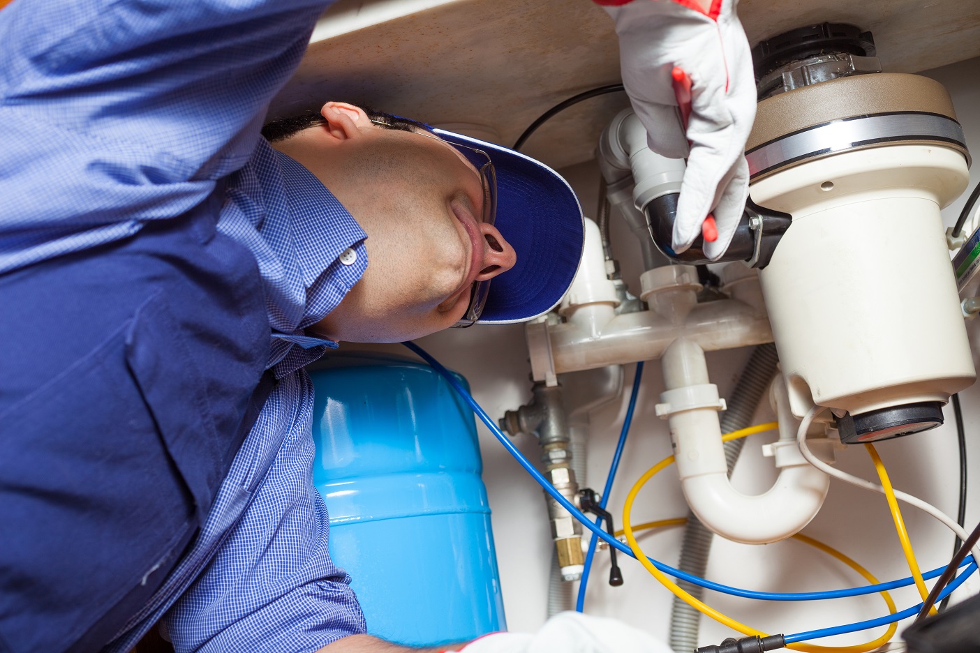 man fixing plumbing repair